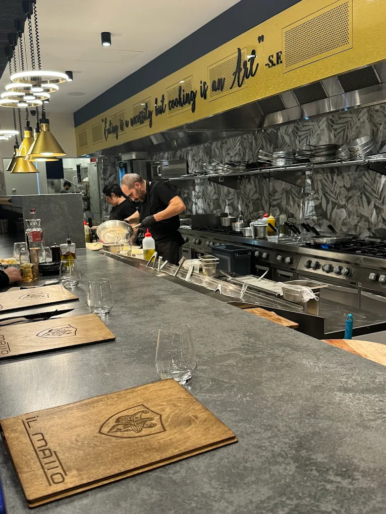 Il Matto chef cooking in the open kitchen